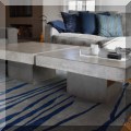 F11. Pair of square CB2 &ldqo;Element” stone and cement coffee tables. 15”h x 31”w x 31”d 